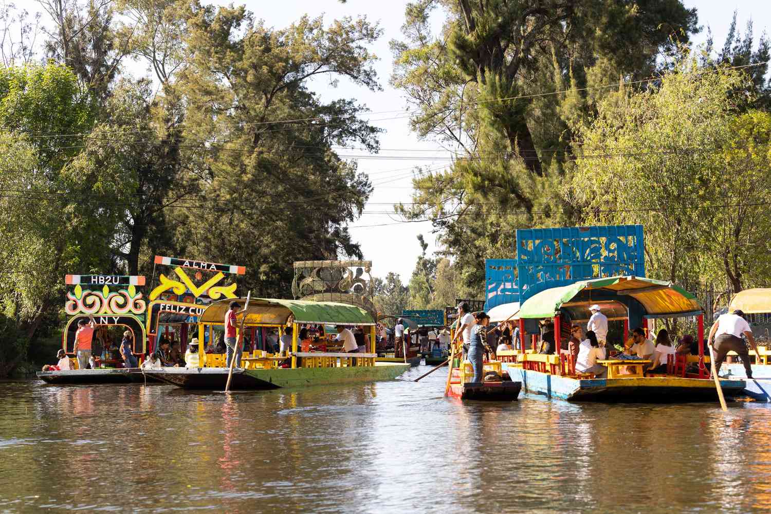 Colorful boats floating down Xochimilco in Mexico City, Mexico