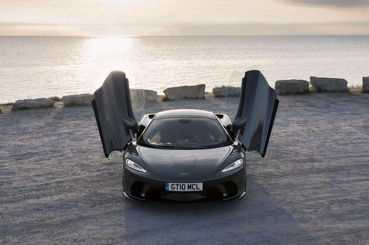 Open side doors of a McLaren GT