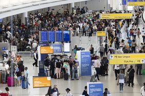 Travelers at John F. Kennedy International Airport 