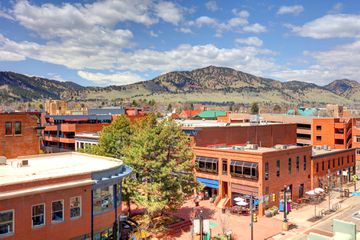 Downtown Boulder surrounded by the Flatiron Mountains