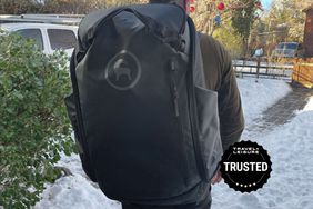 person wearing Backcountry Ski & Snowboard Boot Bag on snowy path