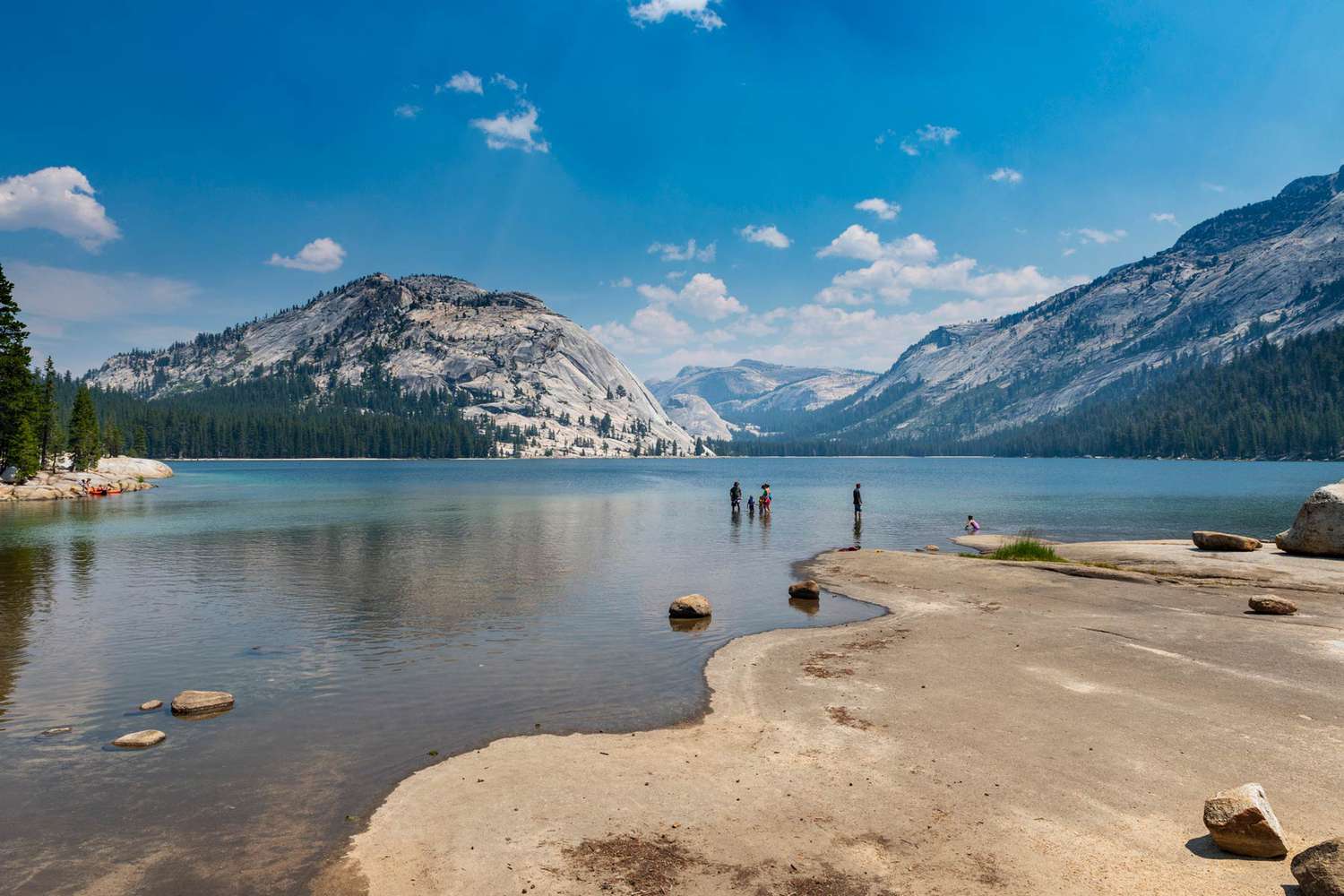 People bathing at the Tenaya Lake, in the Yosemite National Park, California