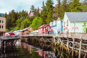 Colorful buildings on stilts over a river in Ketchikan, Alaska