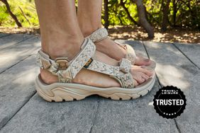 Closeup of a person wearing Teva Terra Fi 5 Universal Sandals outside