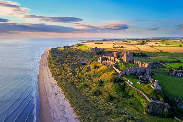 Aerial view of Bamburgh Castle on the coast of Northumberland