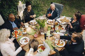 family eating outdoors