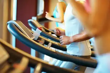 person running on treadmill