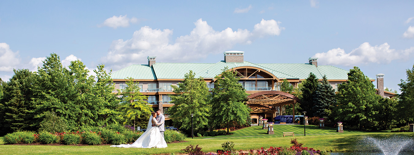 Wedding couple outside of The Lodge at Turning Stone