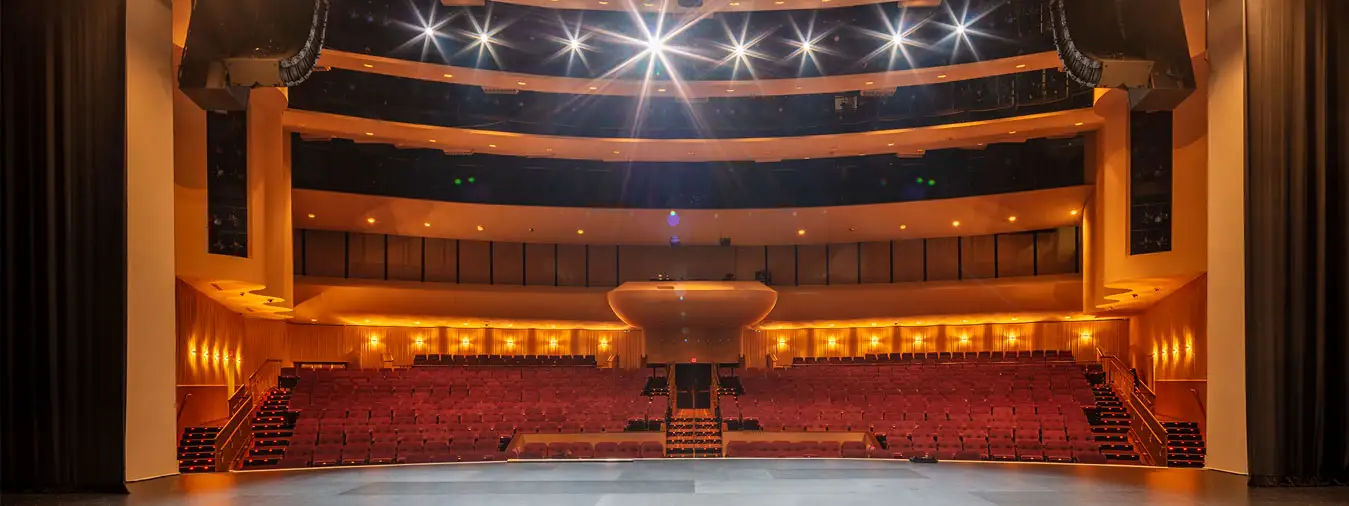 View from the stage in The Showroom looking out at the red stadium seating