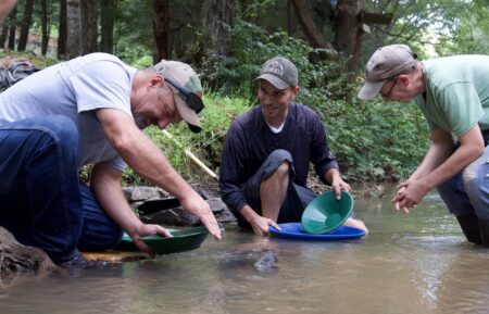 Dave Turin pans with new prospectors Jeff Burnett and Aaron Chandler on the Chestatee River in Georgia on America's Backyard Gold