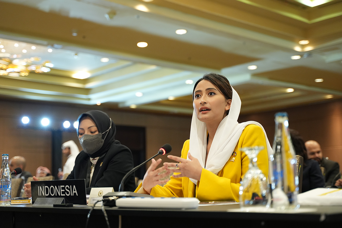 Two women representatives at a meeting