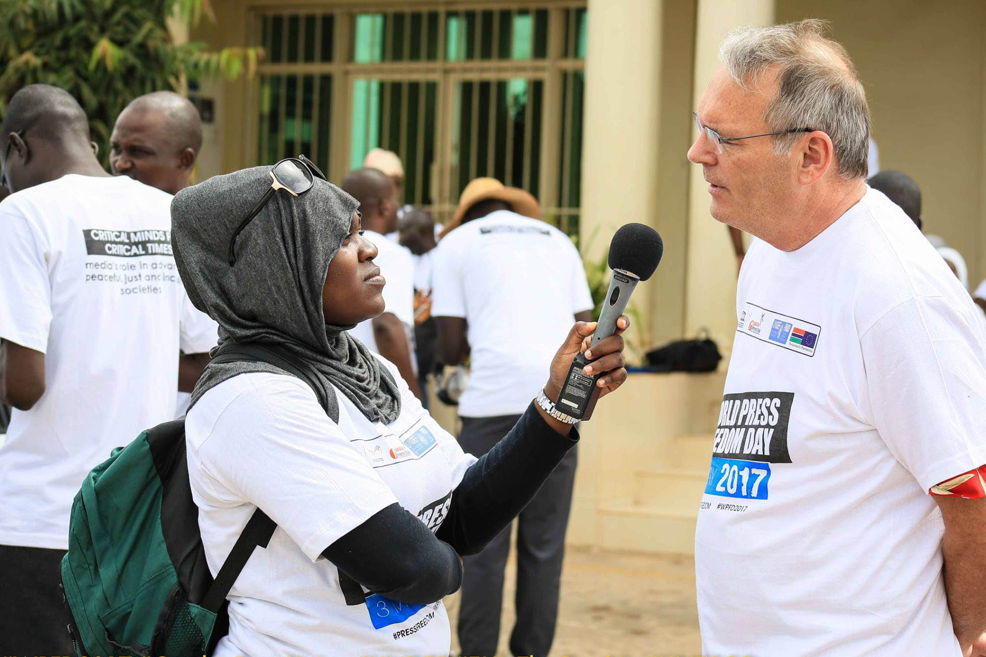 journalist with microphone, interviewing