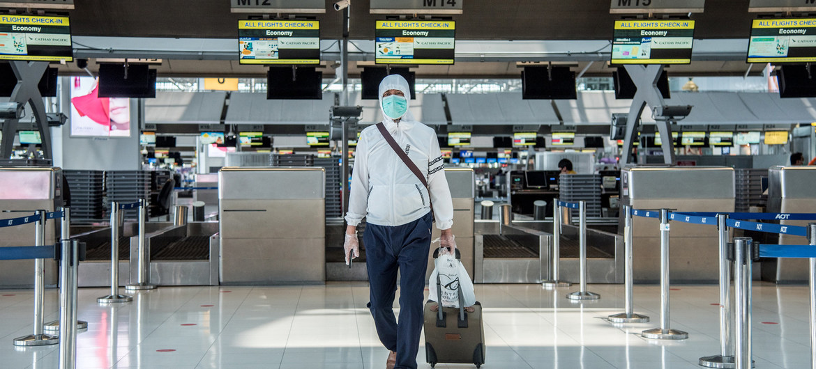 passenger with mask at airport