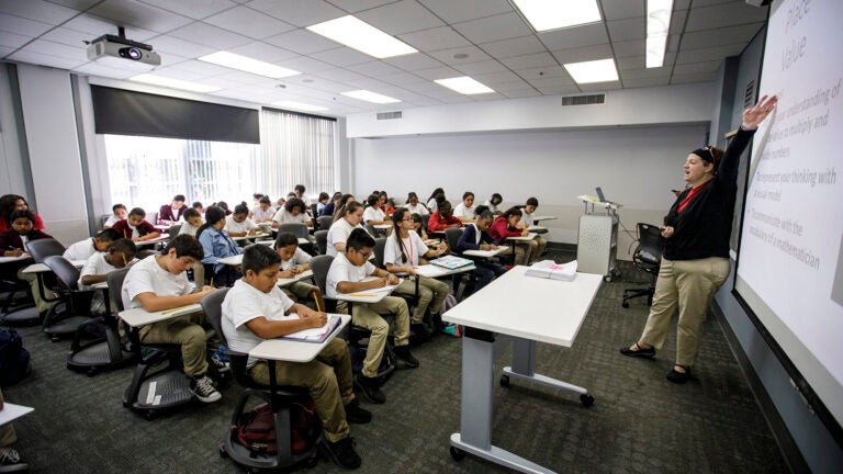 Local youth participate in the USC McMorrow Neighborhood Academic Initiative Saturday Academy kickoff in a classroom at USC.