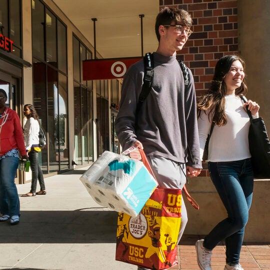 Students shopping at USC Village retailers.