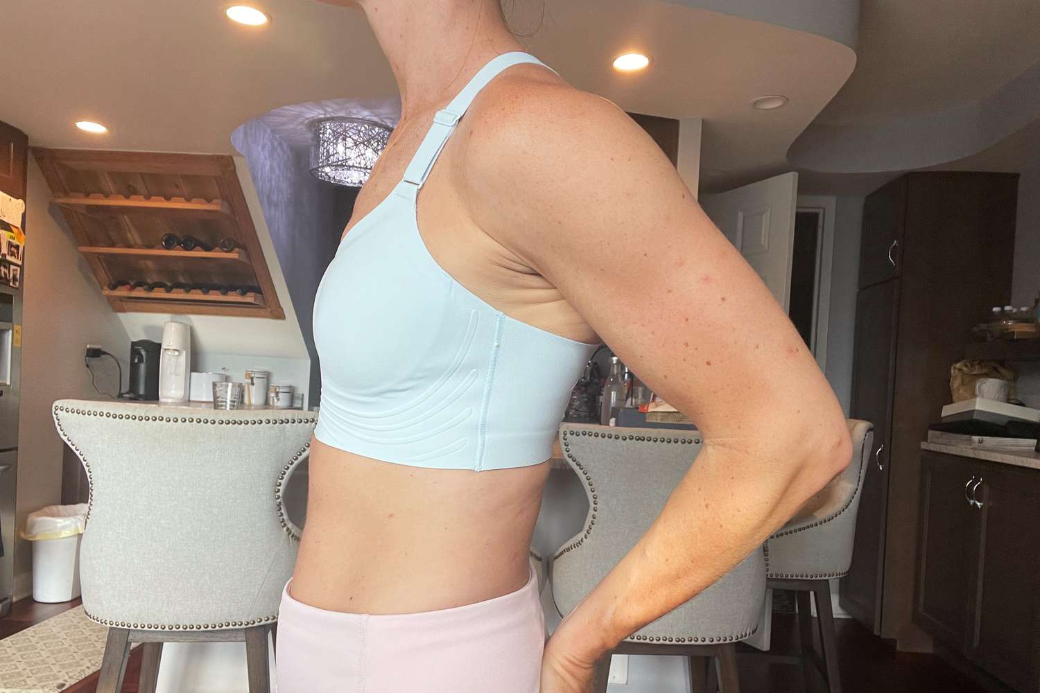 A person wearing the All in Motion High Support Embossed Racerback Run Sports Bra