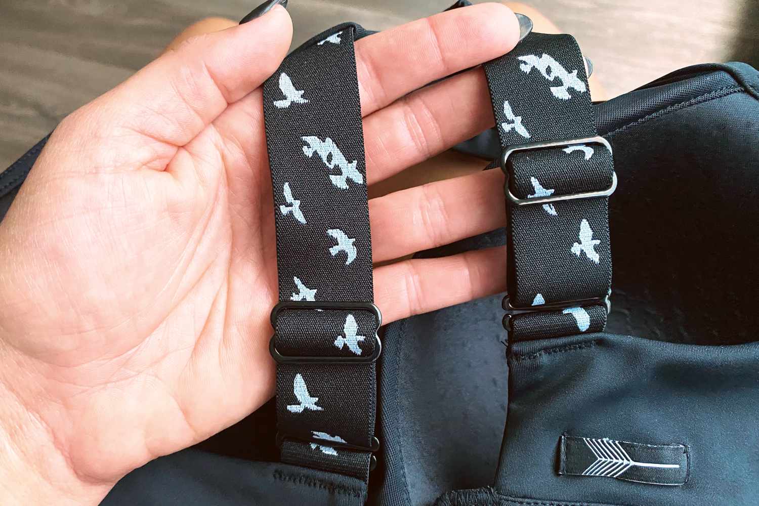 A close up of the straps on the Oiselle Queen Bra