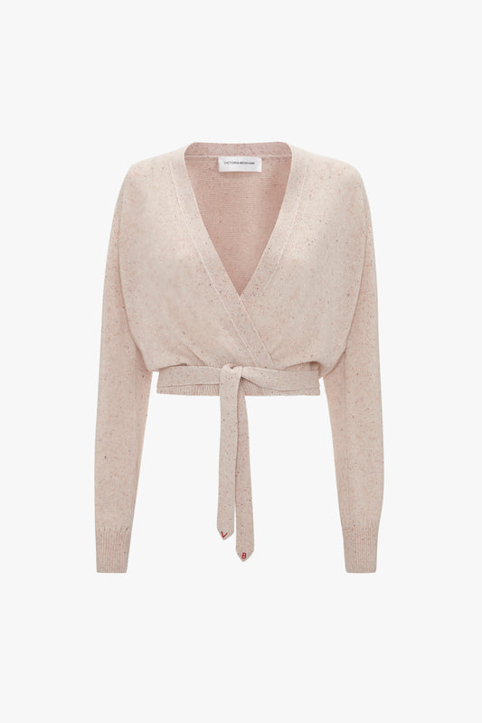 A Wrap Front Cardigan In Nougat with long sleeves and a tie front, crafted from lightweight cashmere for a touch of luxury by Victoria Beckham.