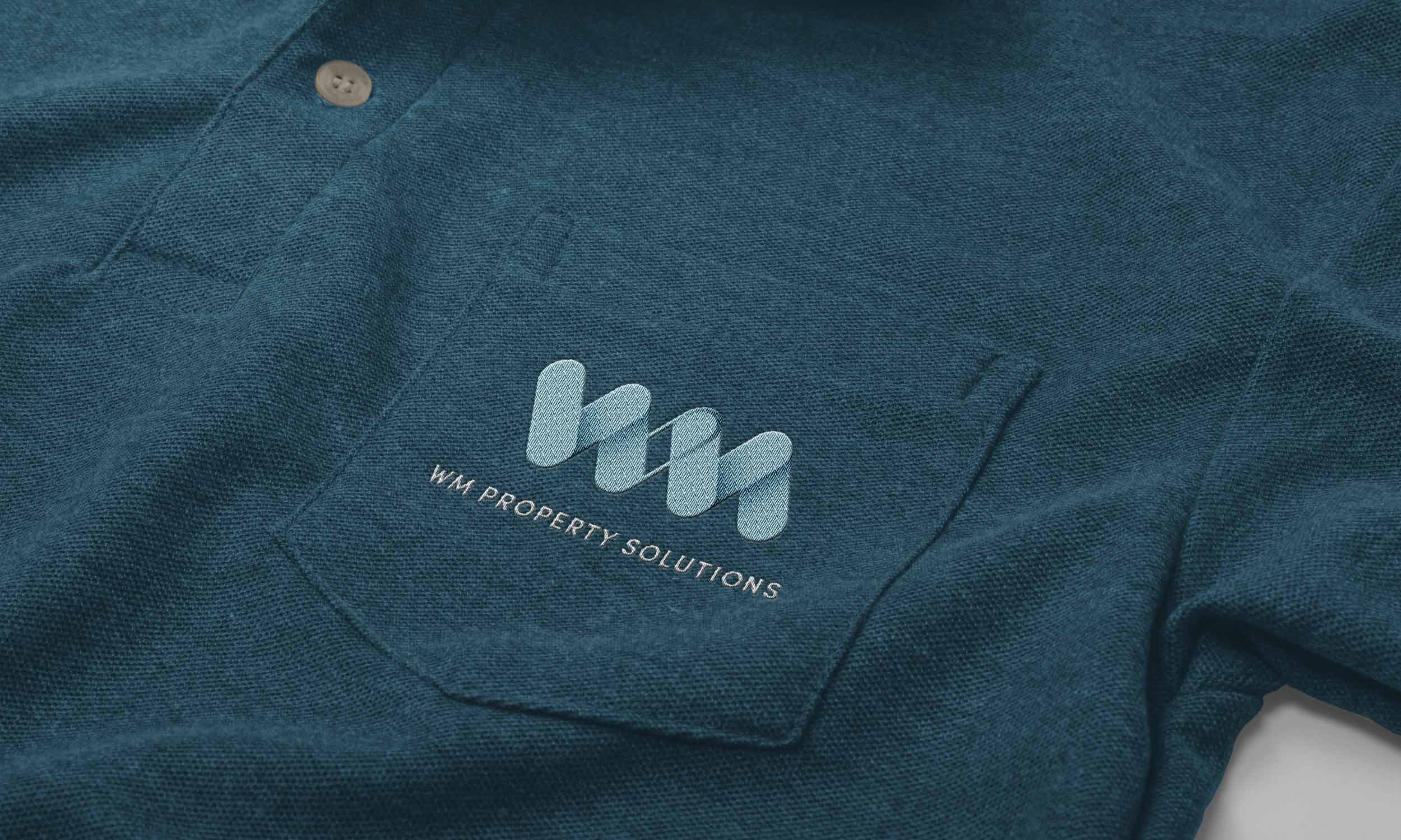 WM Property Solutions logo embroidered on shirt pocket