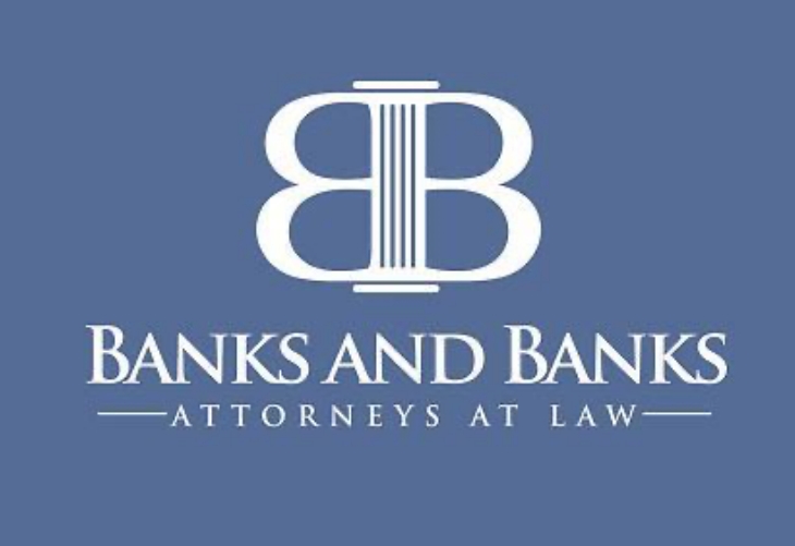 Logo of Banks and Banks, Attorneys at Law, featuring an interlocked double 'B' monogram above the firm's name on a blue background.