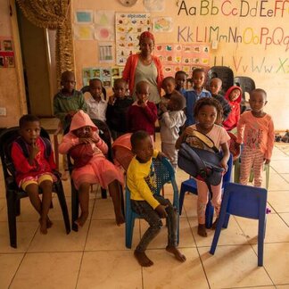 Group of children with adult