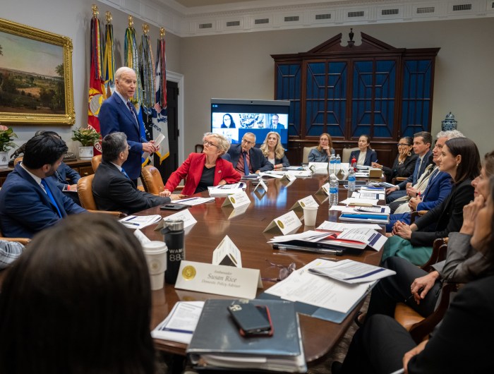 President Joe Biden drops by a meeting with Cabinet members and White House senior staff, Thursday, April 6, 2023, in the Roosevelt Room of the White House.