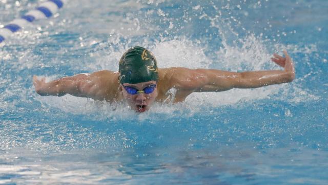 Alex Townsend of Enloe High competes in the Men?0073 100 Yard butterfly. The 2024 4A NCHSAA State Swimming Championships were held in Cary, N.C. at the Triangle Aquatic Center on Saturday, February 10, 2024.  Photos by Dean Strickland, HSOT.com.
