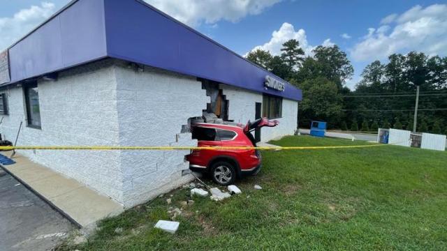 Woman loses control of SUV, crashes into Cary building causing major damage 